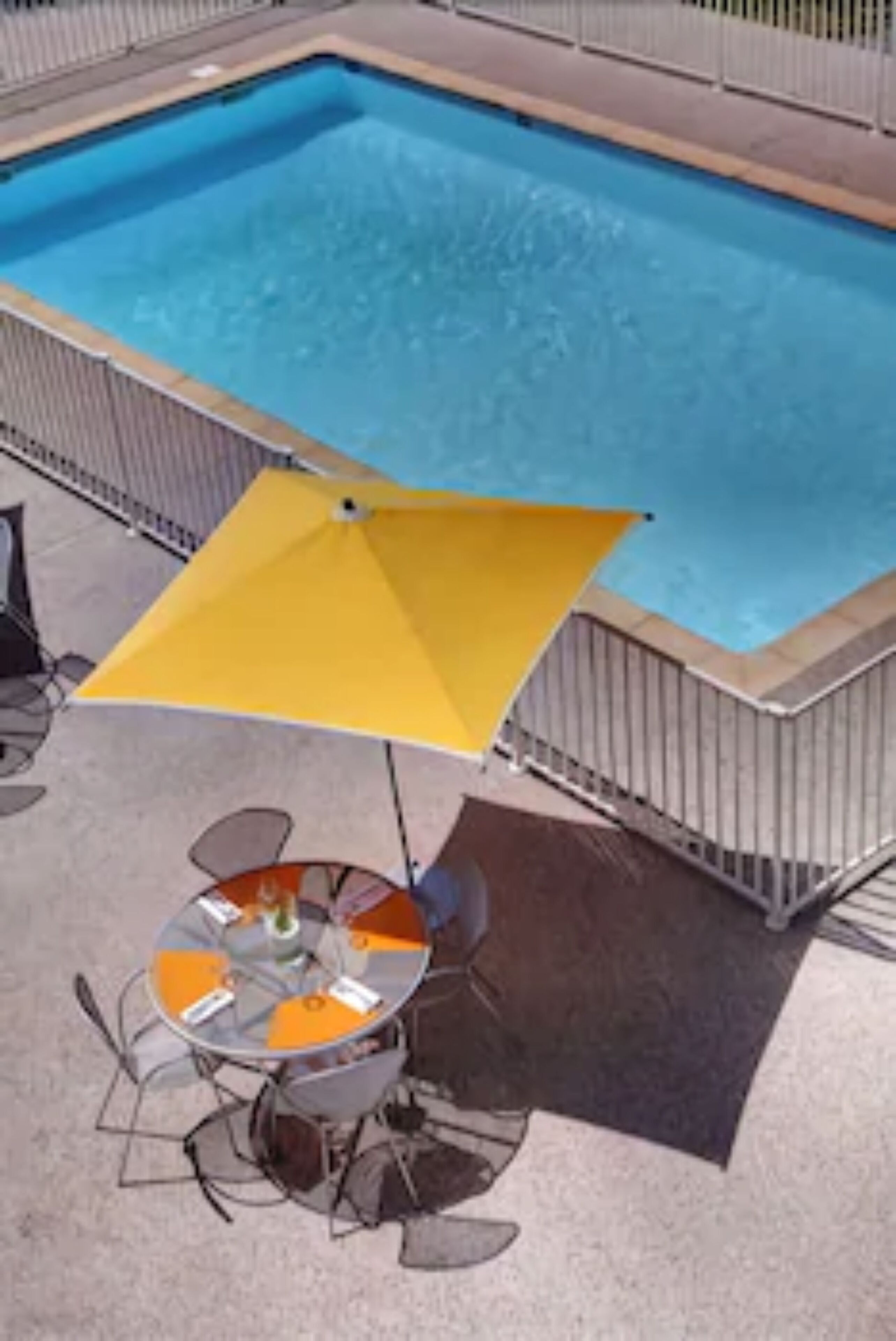 seasonal outdoor pool, open 9:00 am to 9:00 pm, pool loungers