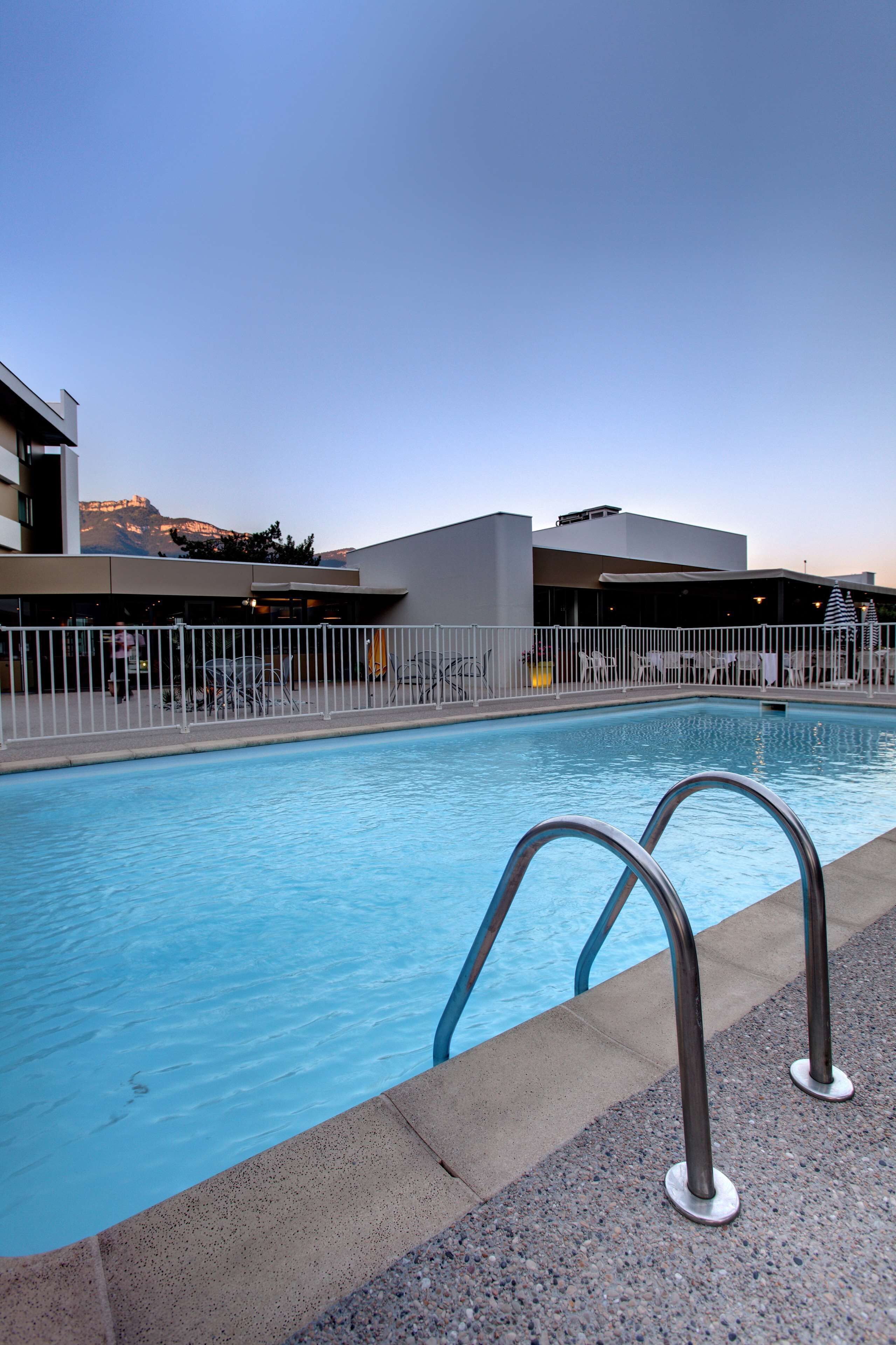 seasonal outdoor pool, open 9:00 am to 9:00 pm, pool loungers