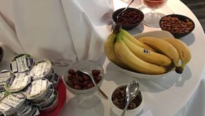 A buffet table with various food items including bananas, cherries, and yogurt. - Alexander Park Chambéry (Chambery)