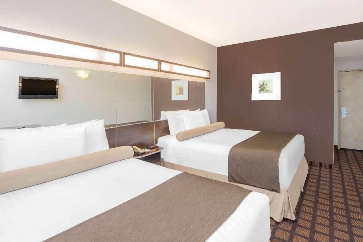 Desk, blackout curtains, free WiFi, bed sheets