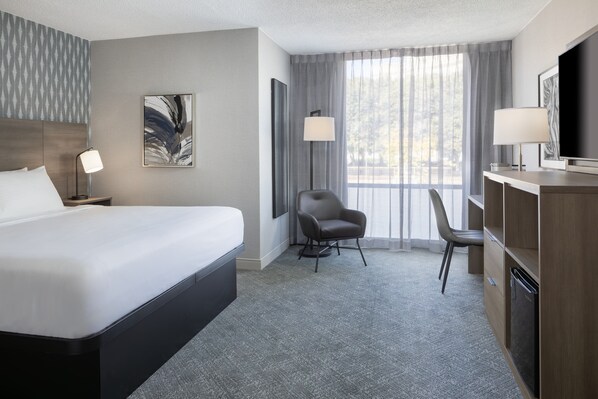 Desk, laptop workspace, blackout curtains, iron/ironing board