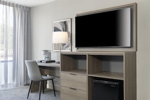 Desk, laptop workspace, blackout drapes, iron/ironing board