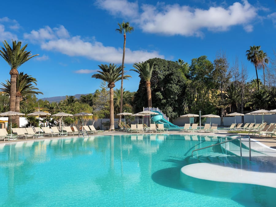 Outdoor pool, pool umbrellas, pool loungers