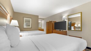 A hotel room with two beds, a TV, a wardrobe, and a mirror. - Best Western Dulles Airport Inn (Sterling)