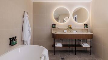Premium Room, 1 King Bed | Bathroom | Shower, eco-friendly toiletries, hair dryer, towels