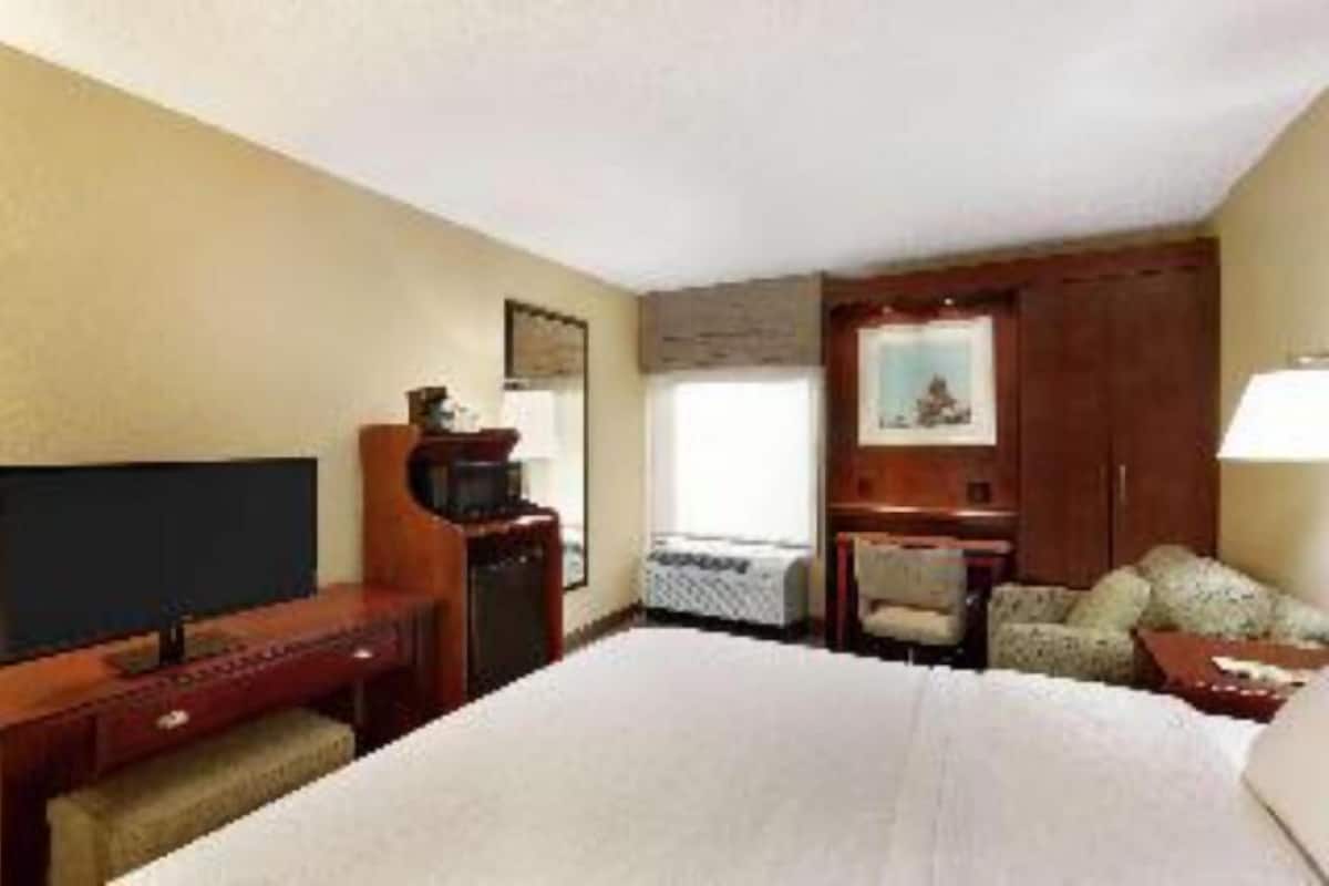 Premium bedding, desk, blackout drapes, iron/ironing board