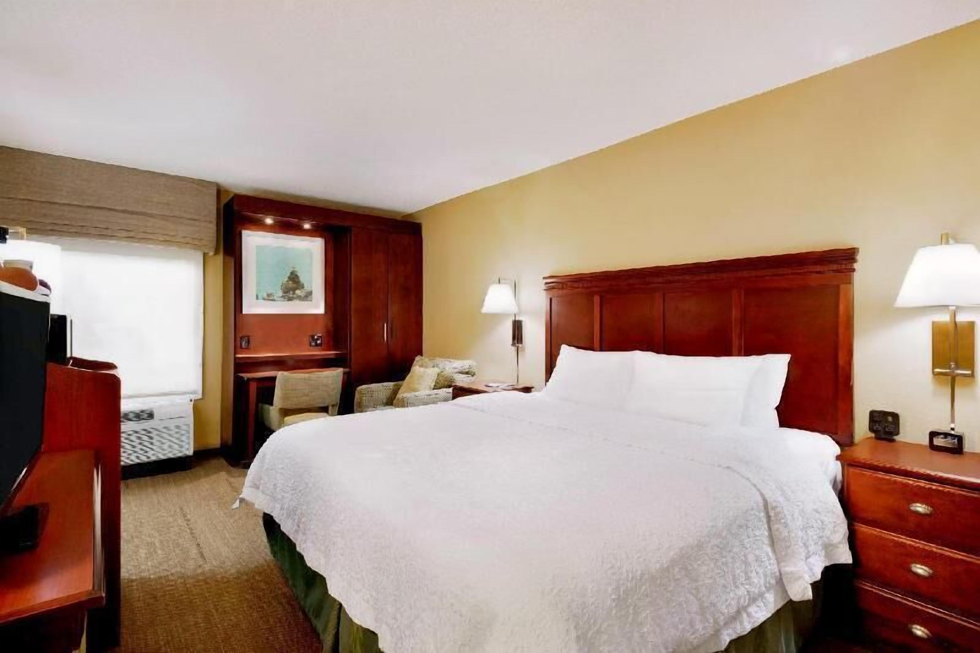 Premium bedding, desk, blackout curtains, iron/ironing board