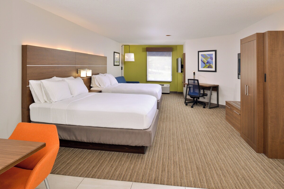 Suite, 2 Queen Beds (Living/Dining Area) | In-room safe, desk, iron/ironing board, cribs (free)