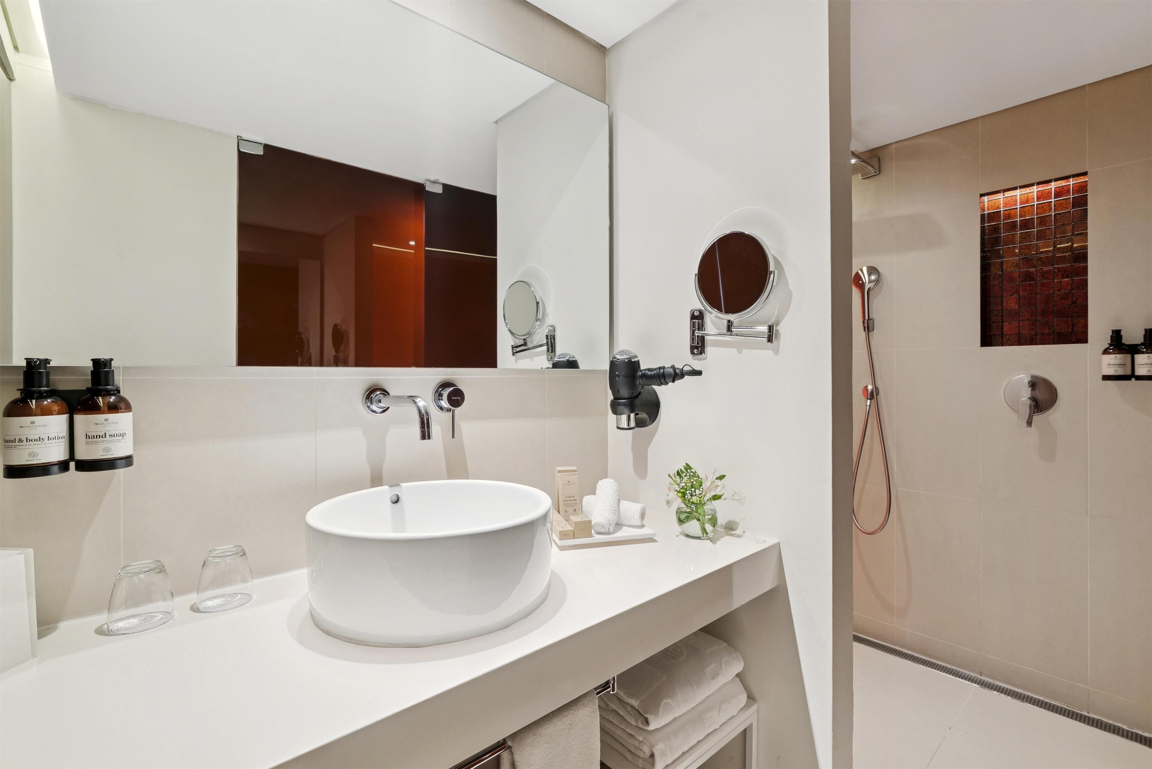 shower, rainfall showerhead, eco-friendly toiletries, hair dryer