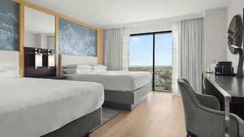 Ropa de cama de alta calidad y caja de seguridad en la habitación