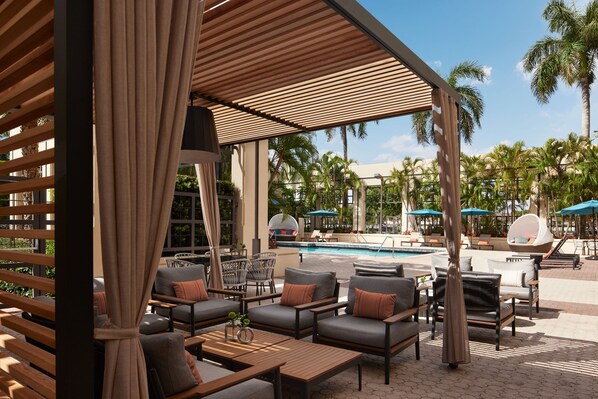 Outdoor pool, free pool cabanas, pool umbrellas