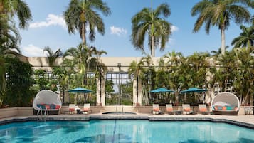 Outdoor pool, free cabanas, pool umbrellas