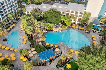 2 outdoor pools, sun loungers at Delta Hotels by Marriott Orlando Celebration