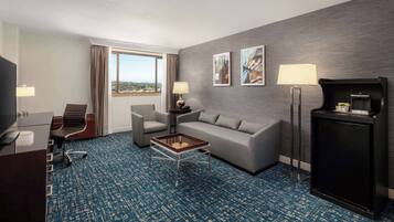 1 King Executive Suite | Living area | 42-inch LCD TV with digital channels, TV