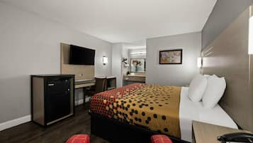 Standard Room, 1 King Bed, Non Smoking | Desk, laptop workspace, blackout drapes, iron/ironing board