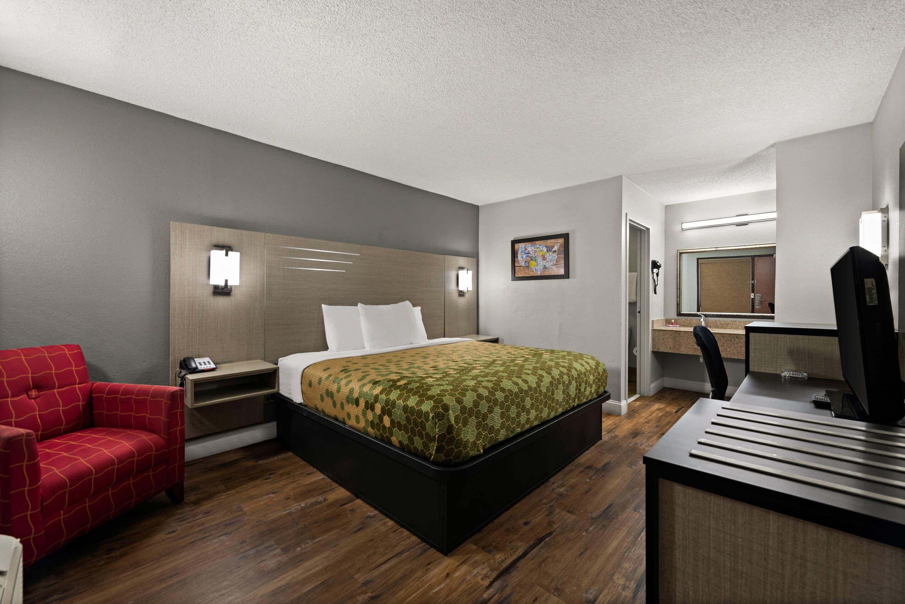 Habitación estándar, 1 cama de matrimonio grande, fumadores | Escritorio, espacio para trabajar con un portátil, cortinas opacas