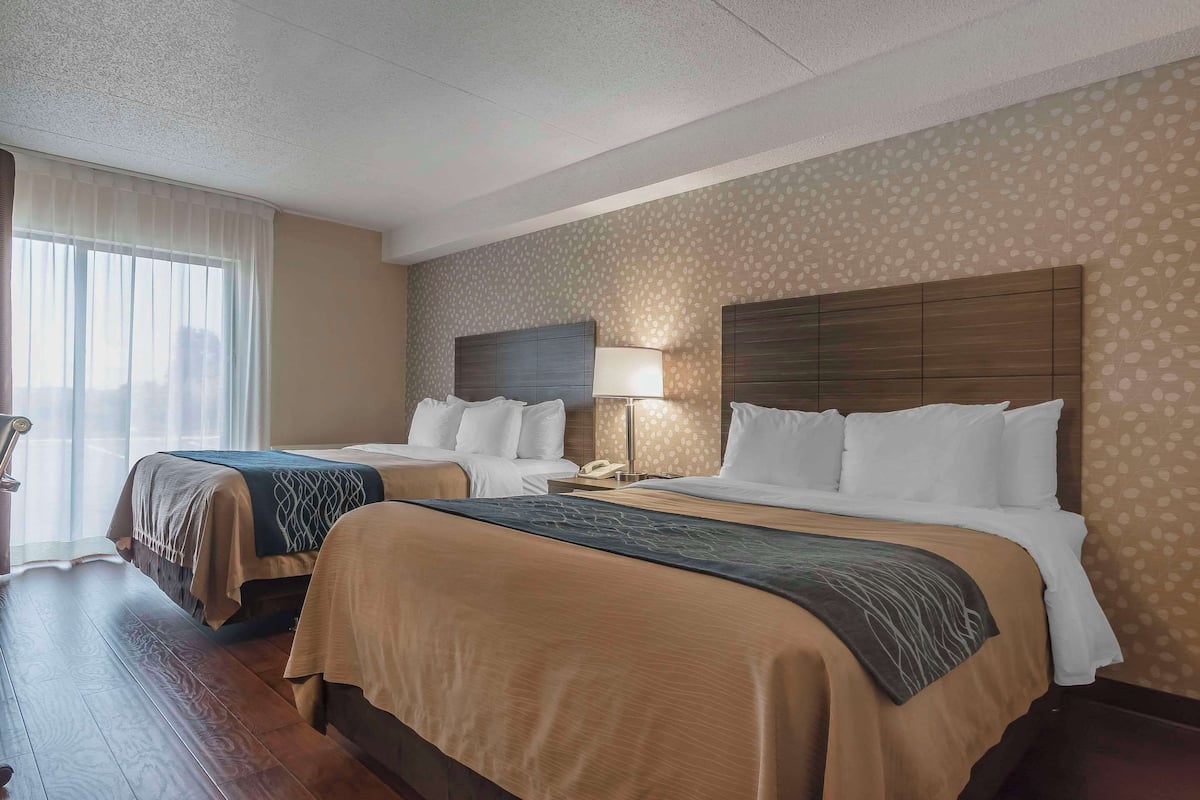 Deluxe Room with 2 Queen Beds, Ground Floor | Premium bedding, pillowtop beds, desk, blackout drapes