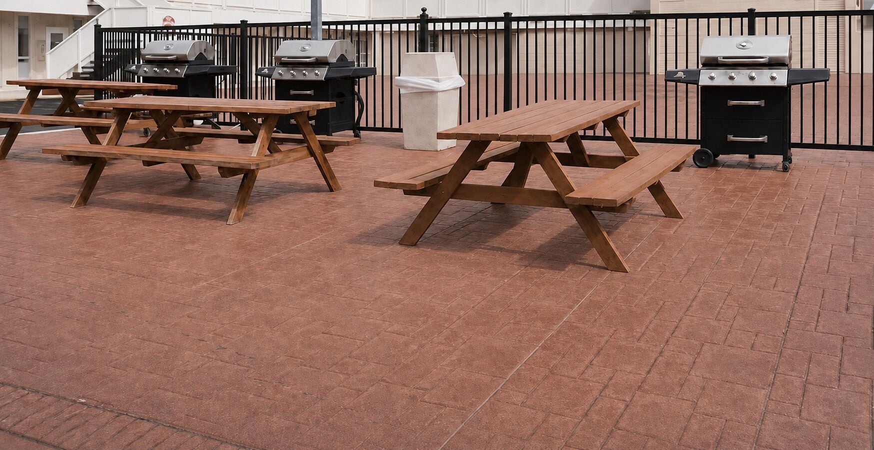 Outdoor picnic tables and grills.