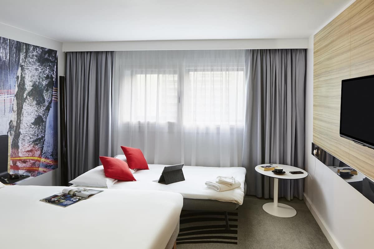 Literie hypoallergénique, minibar, coffres-forts dans les chambres