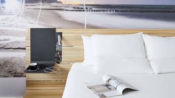 Chambre Familiale, 1 grand lit et 1 canapé-lit | Literie hypoallergénique, minibar, coffres-forts dans les chambres