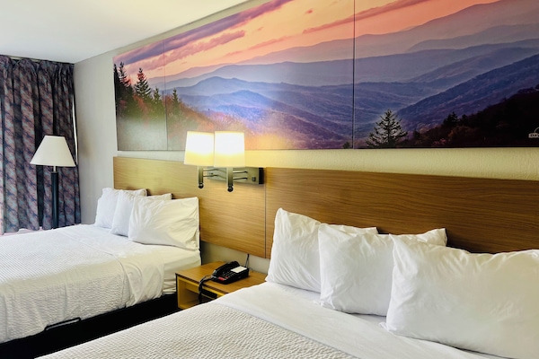 Suite, 2 Queen Beds, Non Smoking | Bathroom | Combined shower/tub, deep soaking tub, hydromassage showerhead