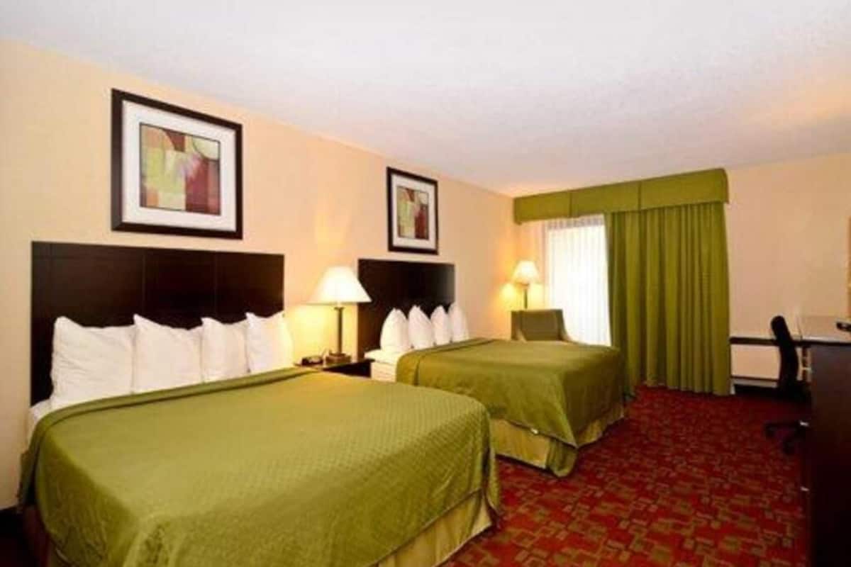 Premium bedding, pillowtop beds, desk, laptop workspace
