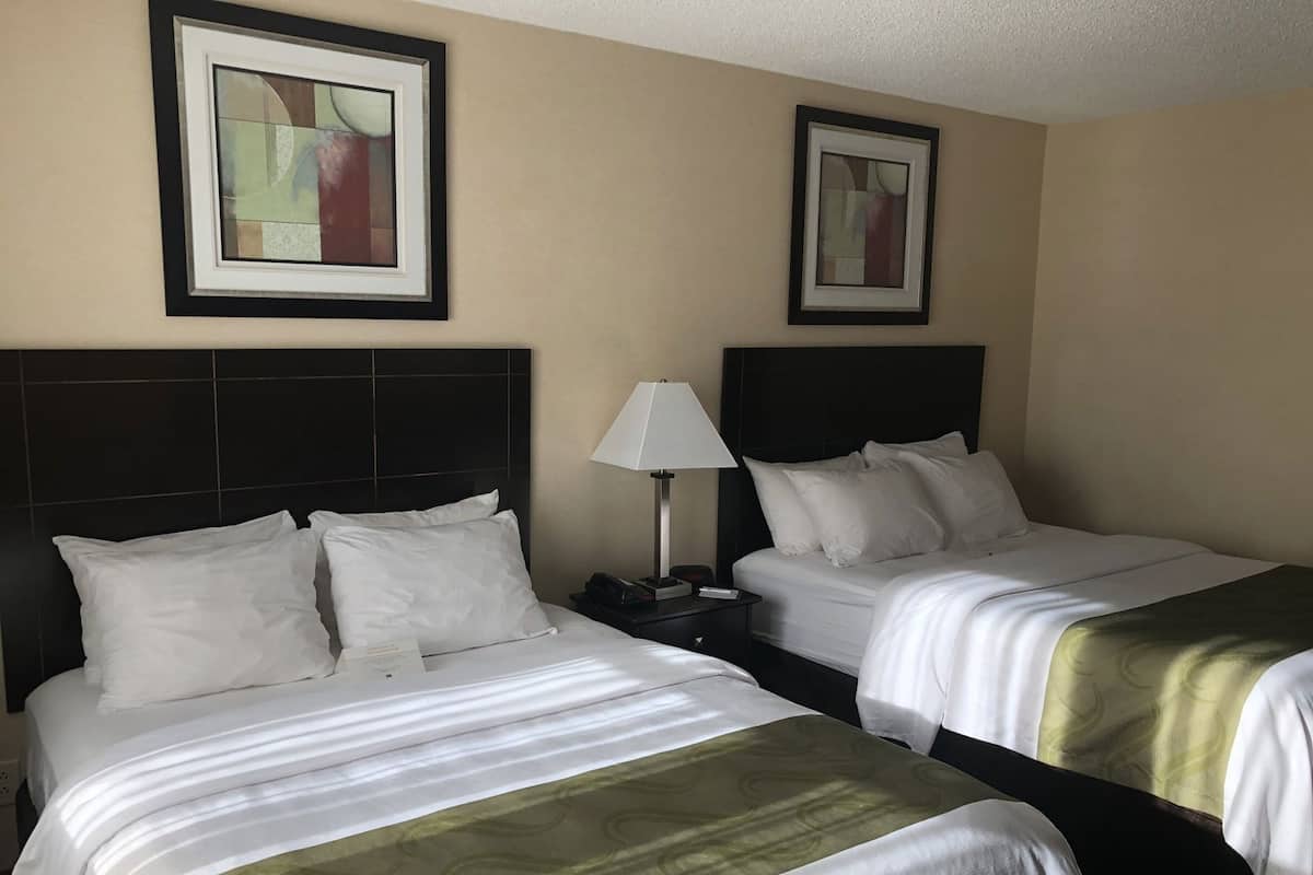Premium bedding, pillowtop beds, desk, laptop workspace