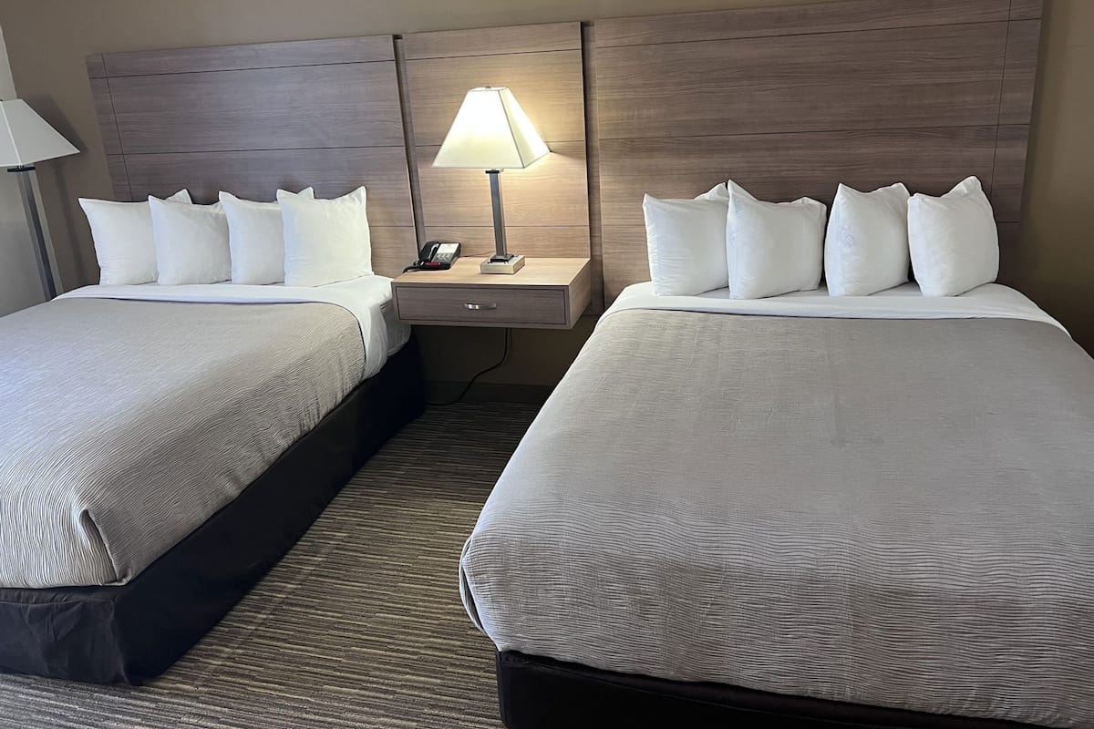 Premium bedding, pillowtop beds, desk, laptop workspace