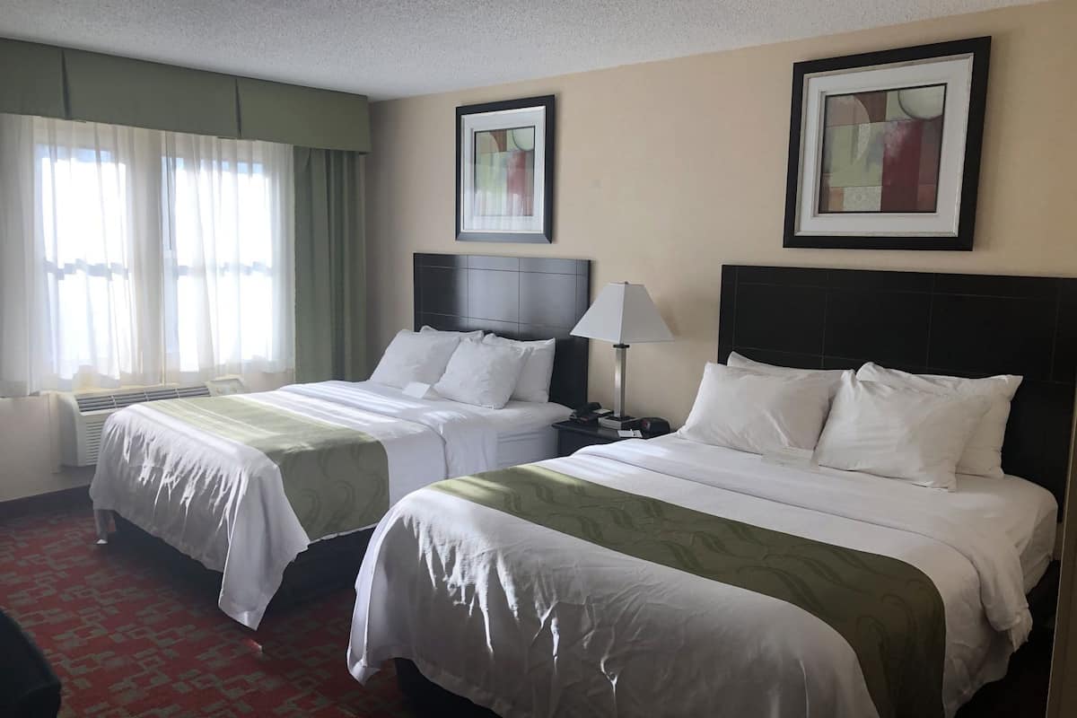 Premium bedding, pillowtop beds, desk, laptop workspace