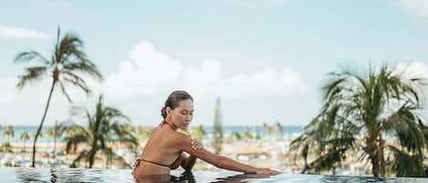 2 outdoor pools, open 7:00 AM to 10:00 PM, pool cabanas (surcharge)