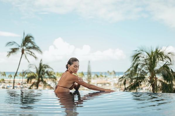 2 outdoor pools, open 7:00 AM to 10:00 PM, cabanas (surcharge)