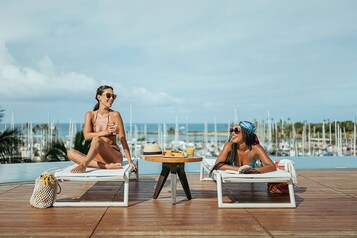 2 outdoor pools, pool cabanas (surcharge), pool loungers