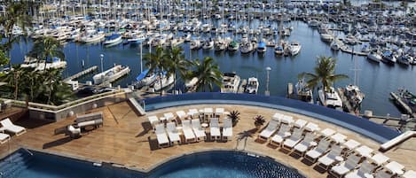 2 outdoor pools, open 7:00 AM to 10:00 PM, pool cabanas (surcharge)