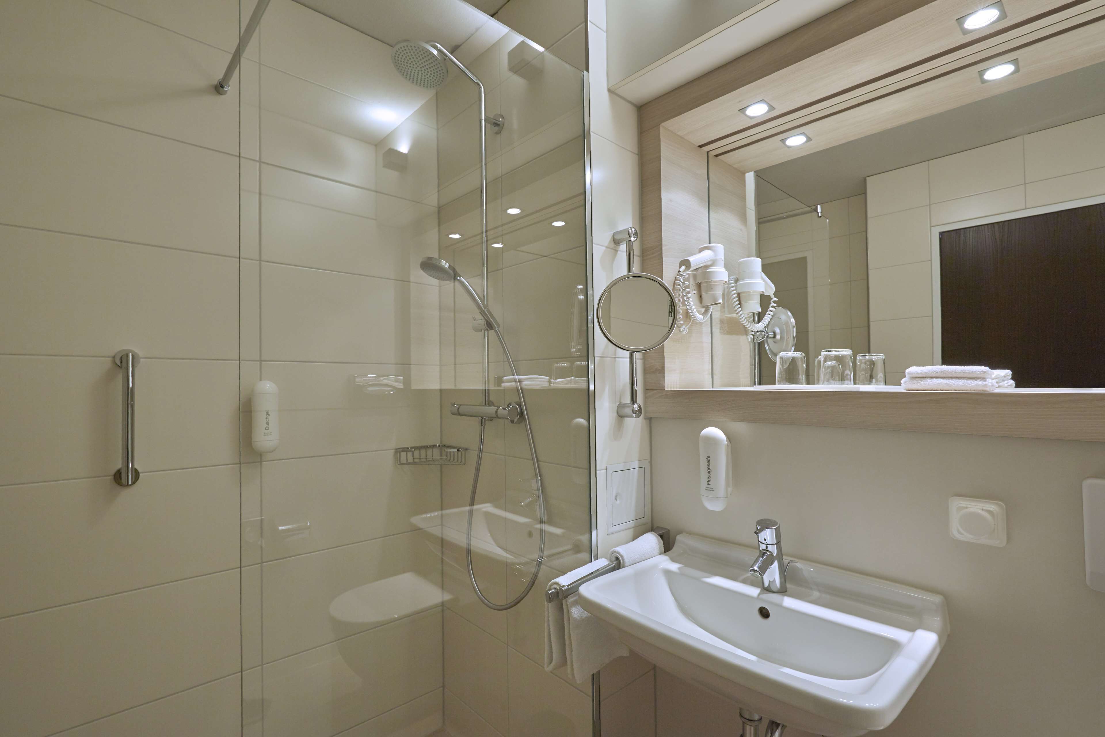 shower, free toiletries, hair dryer, towels