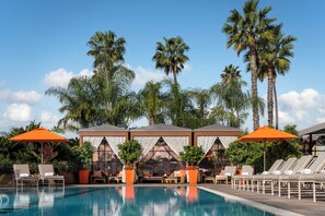 Outdoor pool, cabanas (surcharge), pool umbrellas