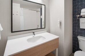 Shower, eco-friendly toiletries, hair dryer, towels