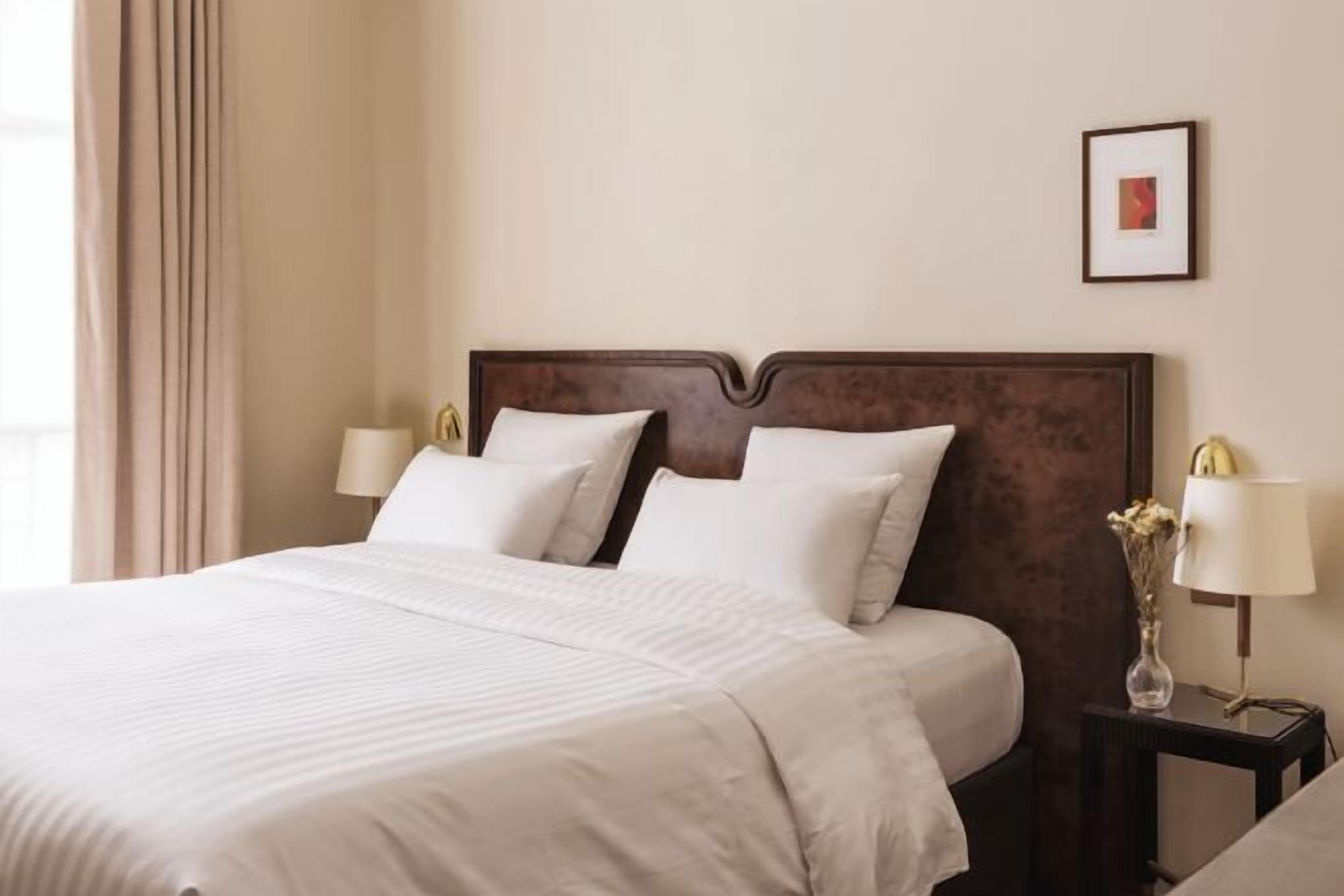 Premium bedding, memory-foam beds, minibar, in-room safe