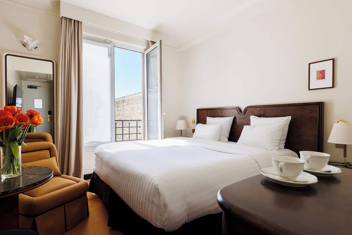 Premium bedding, memory-foam beds, in-room safe, blackout curtains