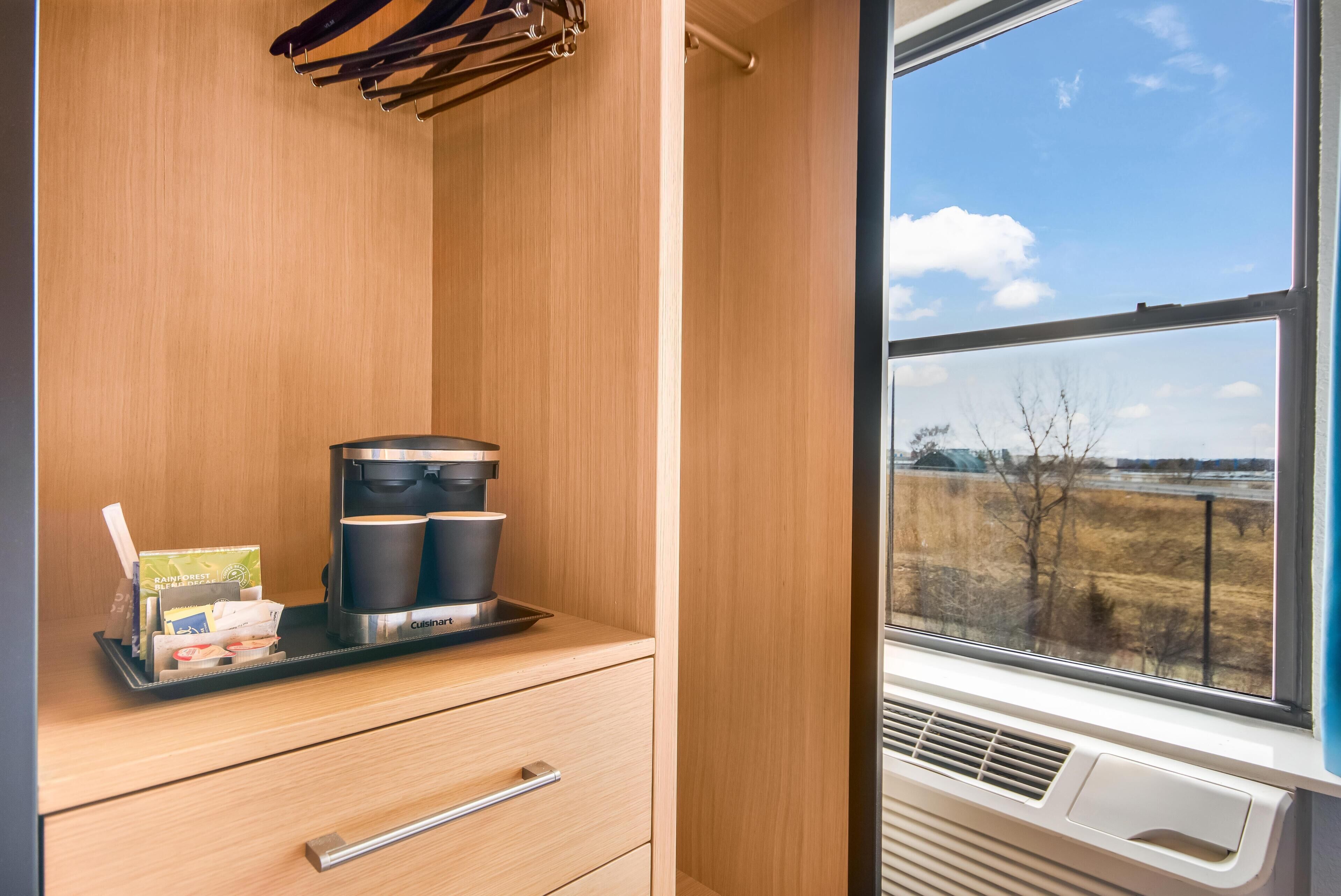 32-inch flat-screen TV with cable channels, TV, pay movies