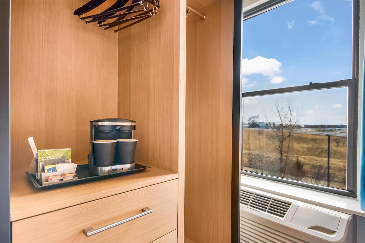 32-inch flat-screen TV with cable channels, TV, pay movies