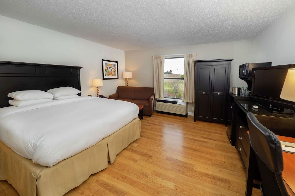 Premium bedding, desk, blackout drapes, iron/ironing board