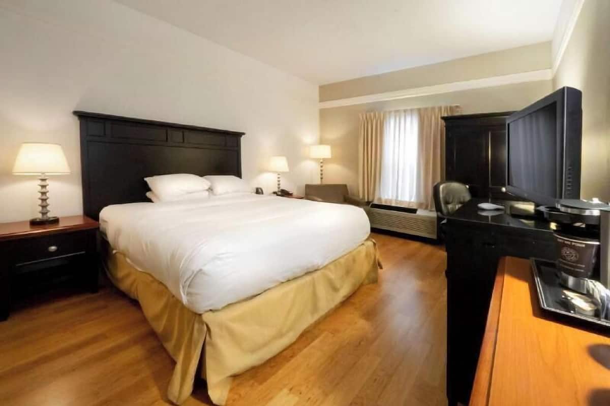 Premium bedding, desk, blackout drapes, iron/ironing board