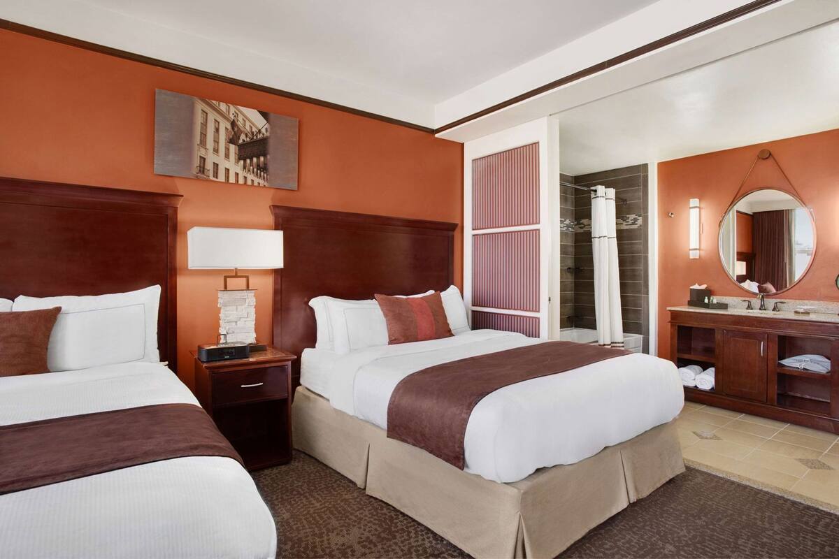 Premium bedding, down comforters, in-room safe, desk