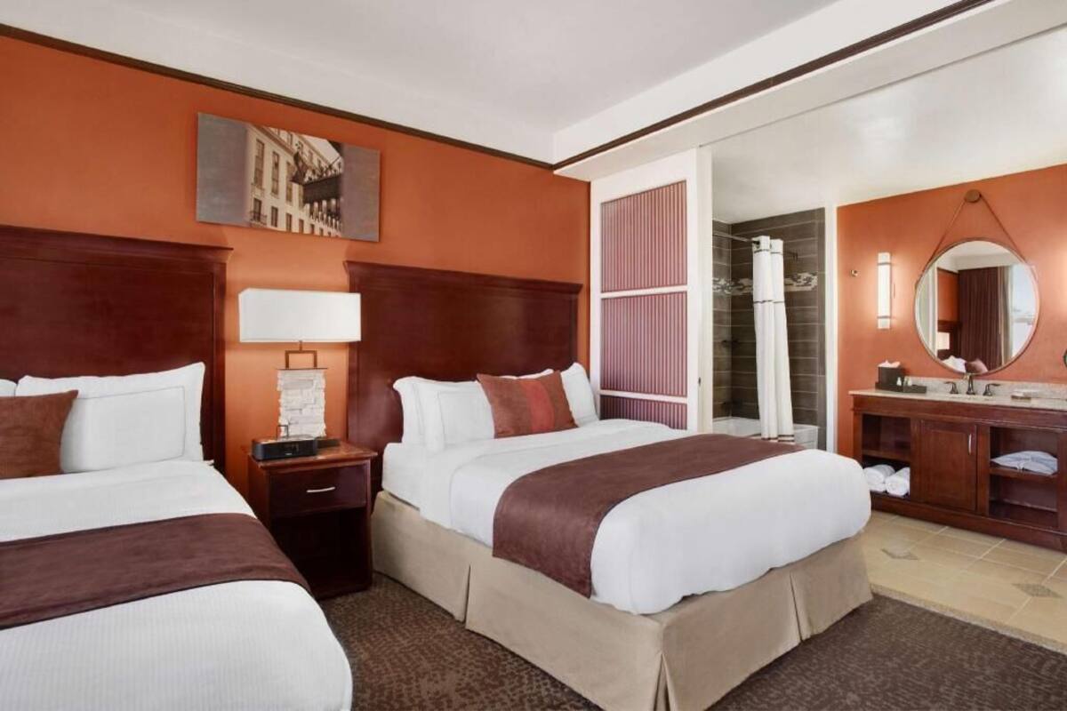 Premium bedding, down comforters, in-room safe, desk