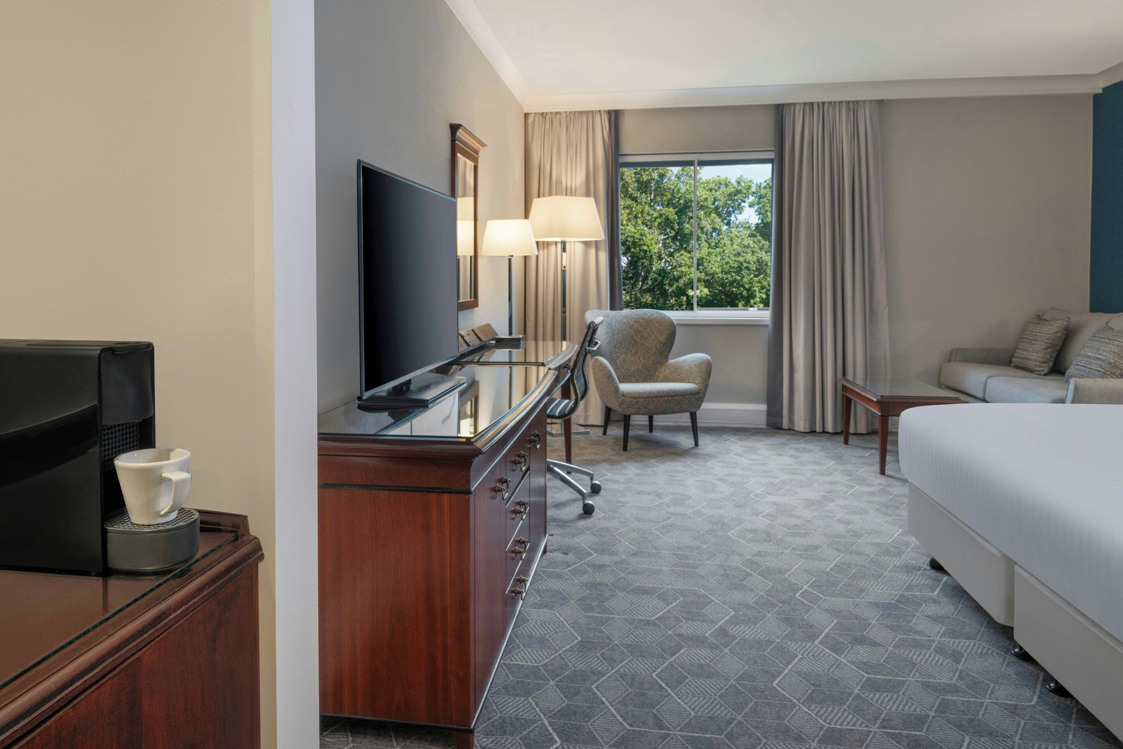 superior room, 1 king bed with sofa bed, non smoking | premium bedding, in-room safe, desk, blackout curtains