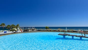 Indoor pool, seasonal outdoor pool, pool umbrellas, sun loungers