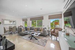 Deluxe Townhome, 2 Bedrooms, Hot Tub | Living area | 40-inch flat-screen TV with digital channels
