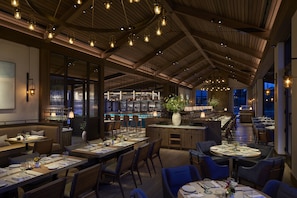Breakfast, dinner served; American cuisine, golf course views