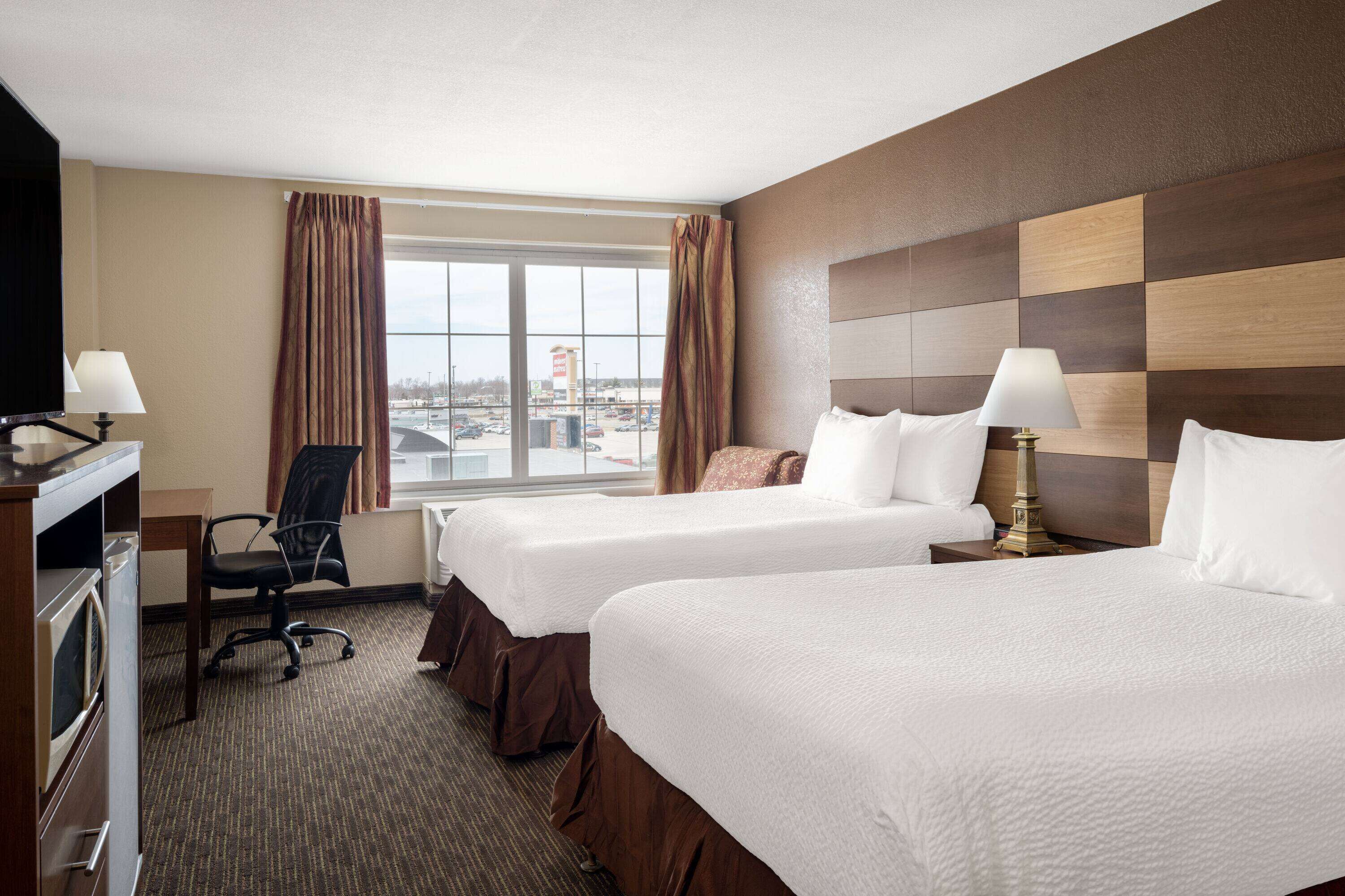 Room, 2 Double Beds, Non Smoking | In-room safe, individually decorated, individually furnished, desk