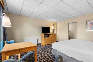 Blackout drapes, soundproofing, iron/ironing board, free WiFi